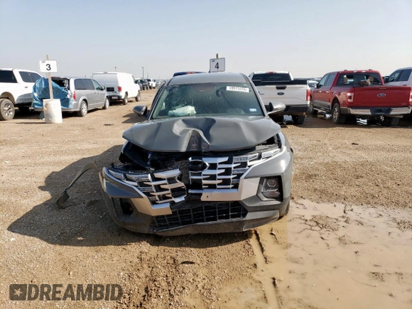 2023 Hyundai Santa Cruz SEL with VIN 5NTJBDAEXPH061824, listed as a Copart auction lot 59975255 with 56,492 mi miles and Salvage title. Bid and sale history available at DreamBid. Image 5.