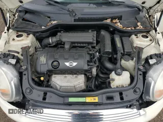 2011 MINI Hardtop z VIN WMWSU3C56BT096298, wystawiony jako Copart lot #55764375 z przebiegiem 141 499 mil mil oraz Szkody całkowita. Historia ofert i sprzedaży dostępna na DreamBid. Obrazek 11.
