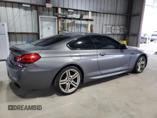 2015 BMW 6 Series 650i xDrive z VIN WBAYM1C53FD325311, wystawiony jako Copart lot #59563355 z przebiegiem 157 675 mil mil oraz Czysty tytuł • Clean title. Historia ofert i sprzedaży dostępna na DreamBid. Obrazek 3.