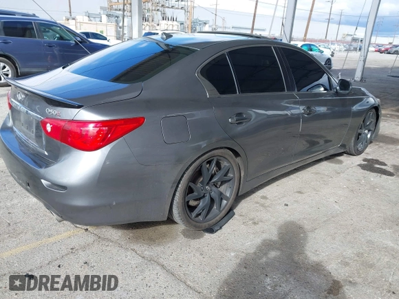 2015 Infiniti Q50 Premium with VIN JN1BV7AP1FM330183, listed as a IAAI auction lot 41788224 with 139,818 mi miles. Bid and sale history available at carsss.com. Image 4.