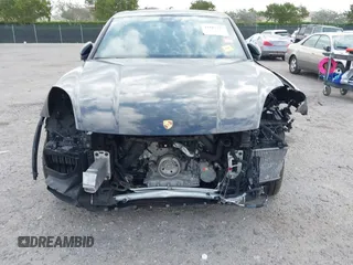 2021 Porsche Cayenne E-Hybrid Hybrid z VIN WP1AE2AYXMDA24566, wystawiony jako IAAI lot #41815737 z przebiegiem 51 149 mil mil oraz . Historia ofert i sprzedaży dostępna na DreamBid. Obrazek 6.
