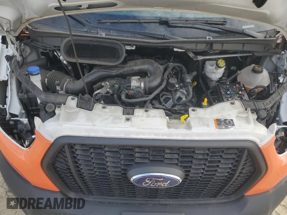 2022 Ford Transit Cargo with VIN 1FTBR1C87NKA45518, listed as a Copart auction lot 84879794 with 54,272 mi miles and Salvage Title. Bid and sale history available at DreamBid. Image 12.
