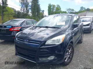 2013 Ford Escape SEL with VIN 1FMCU0H97DUC94687, listed as a IAAI auction lot 42024797 with 207,216 mi miles. Bid and sale history available at carsss.com. Image 2.