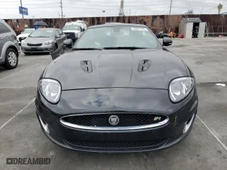 2013 Jaguar XK with VIN SAJWA4DC6DMB50779, listed as a Copart auction lot 50687705 with 106,826 mi miles and Clean Title. Bid and sale history available at carsss.com. Image 5.