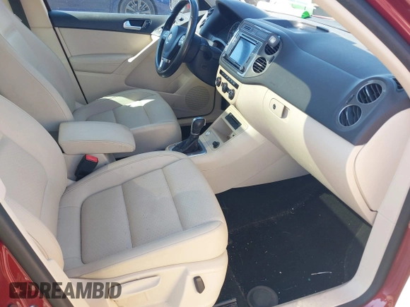 2016 Volkswagen Tiguan S with VIN WVGBV7AX4GW021564, listed as a IAAI auction lot 41995637 with 96,167 mi miles and . Bid and sale history available at DreamBid. Image 5.