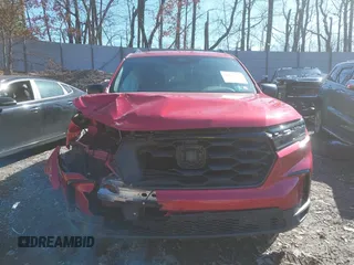2025 Honda Pilot Sport z VIN 5FNYG1H3XSB008811, wystawiony jako IAAI lot #41842737 z przebiegiem 10 435 mil mil oraz . Historia ofert i sprzedaży dostępna na DreamBid. Obrazek 13.