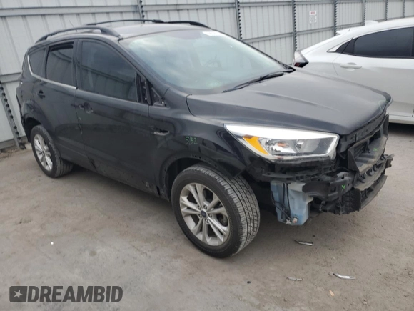 2017 Ford Escape SE with VIN 1FMCU0GD7HUE72044, listed as a Copart auction lot 48565255 with 125,052 mi miles and Salvage Title. Bid and sale history available at DreamBid. Image 4.
