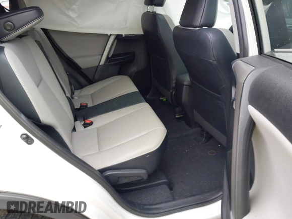 2016 Toyota RAV4 Limited with VIN 2T3YFREV6GW293418, listed as a IAAI auction lot 42367428 with 210,000 mi miles and . Bid and sale history available at DreamBid. Image 8.