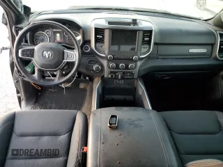 2021 Ram 1500 Big Horn z VIN 1C6RREFG2MN812561, wystawiony jako Copart lot #75305674 z przebiegiem Nie podano mil oraz Szkoda całkowita • Salvage title. Historia ofert i sprzedaży dostępna na DreamBid. Obrazek 8.