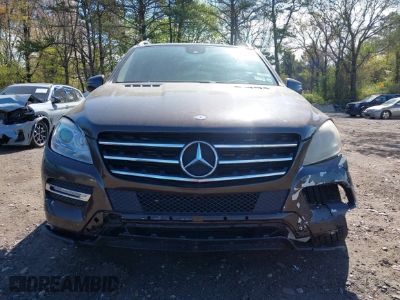 2014 Mercedes-Benz M 350 with VIN 4JGDA5HB3EA269415, listed as a IAAI auction lot 42118165 with 73,149 mi miles and . Bid and sale history available at DreamBid. Image 12.