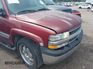 2002 Chevrolet Suburban LT z VIN 1GNEC16Z72J252681, wystawiony jako IAAI lot #42375392 z przebiegiem 312 135 mil mil oraz . Historia ofert i sprzedaży dostępna na DreamBid. Obrazek 6.