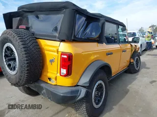 2022 Ford Bronco with VIN 1FMEE5DH6NLB14350, listed as a IAAI auction lot 41486823 with 27,587 mi miles and . Bid and sale history available at DreamBid. Image 4.