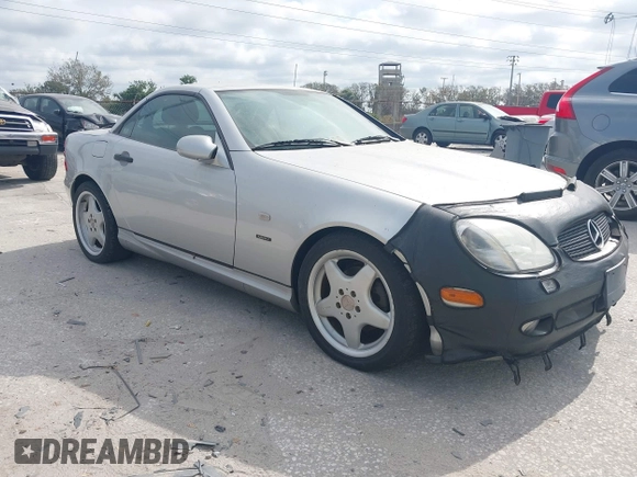 1999 Mercedes-Benz SLK 230/320 with VIN WDBKK47F1XF086736, listed as a IAAI auction lot 41580240 with 56,822 mi miles and . Bid and sale history available at DreamBid. Image 1.