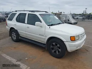1998 Isuzu Rodeo S with VIN 4S2CM58W0W4331738, listed as a IAAI auction lot 42074562 with 237,684 mi miles. Bid and sale history available at carsss.com. Image 1.