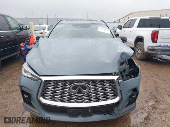2023 Infiniti QX55 Luxe z VIN 3PCAJ5JRXPF109797, wystawiony jako IAAI lot #41455665 z przebiegiem 31 561 mil mil oraz . Historia ofert i sprzedaży dostępna na DreamBid. Obrazek 12.