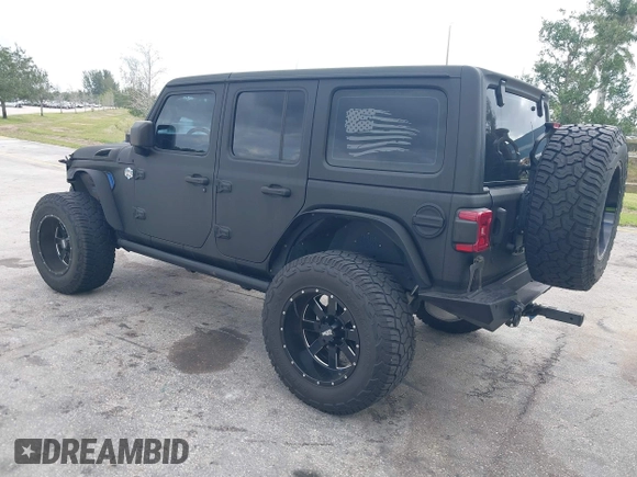 2018 Jeep Wrangler Unlimited Sport S z VIN 1C4HJXDG2JW228483, wystawiony jako IAAI lot #41710364 z przebiegiem 56 970 mil mil oraz . Historia ofert i sprzedaży dostępna na DreamBid. Obrazek 3.