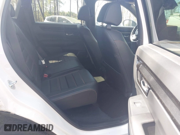 2023 Honda CR-V Sport Touring with VIN 5J6RS6H90PL003877, listed as a IAAI auction lot 41938027 with 38,500 mi miles and . Bid and sale history available at DreamBid. Image 8.