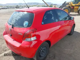 2010 Toyota Yaris with VIN JTDJT4K32A5318619, listed as a IAAI auction lot 41949602 with 134,614 mi miles. Bid and sale history available at carsss.com. Image 4.