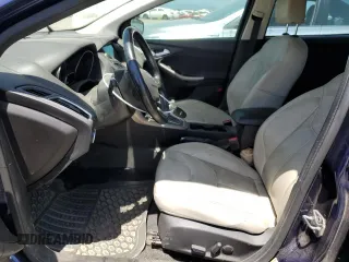 2016 Ford Focus Titanium z VIN 1FADP3J2XGL319399, wystawiony jako Copart lot #59258745 z przebiegiem 215 296 mil mil oraz Szkoda całkowita • Salvage title. Historia ofert i sprzedaży dostępna na DreamBid. Obrazek 7.