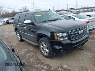 2010 Chevrolet Tahoe LTZ with VIN 1GNUKCE05AR285451, listed as a IAAI auction lot 41394376 with 288,966 mi miles and . Bid and sale history available at DreamBid. Image 1.