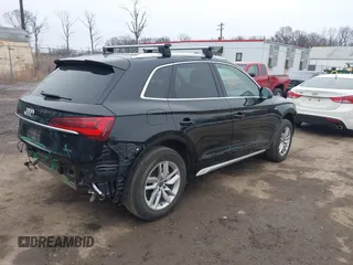 2022 Audi Q5 S line Premium z VIN WA1GAAFY0N2019698, wystawiony jako IAAI lot #41549059 z przebiegiem 24 105 mil mil oraz . Historia ofert i sprzedaży dostępna na DreamBid. Obrazek 4.