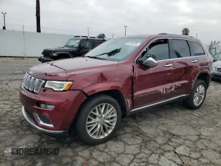 2017 Jeep Grand Cherokee Summit with VIN 1C4RJFJT1HC801529, listed as a Copart auction lot 43164135 with 129,690 mi miles and Salvage title. Bid and sale history available at DreamBid. Image 1.