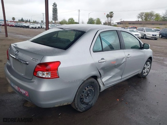 2010 Toyota Yaris with VIN JTDBT4K36A4066738, listed as a IAAI auction lot 41815154 with 159,553 mi miles. Bid and sale history available at carsss.com. Image 4.