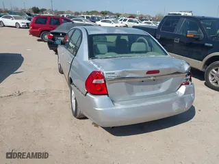 2005 Chevrolet Malibu LS with VIN 1G1ZT52815F299932, listed as a IAAI auction lot 41660784 with 169,486 mi miles. Bid and sale history available at carsss.com. Image 3.