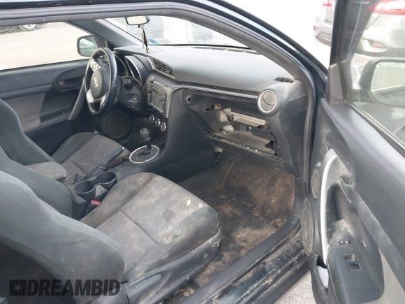 2015 Scion tC with VIN JTKJF5C7XFJ001662, listed as a IAAI auction lot 41843123 with 128,851 mi miles. Bid and sale history available at carsss.com. Image 5.