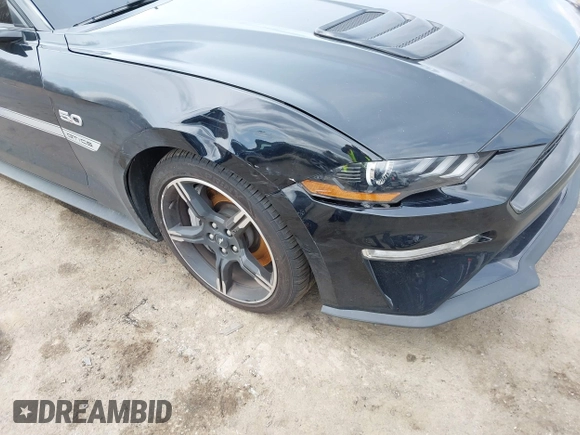 2021 Ford Mustang GT Premium with VIN 1FATP8FF4M5143096, listed as a IAAI auction lot 42013344 with 20,221 mi miles and . Bid and sale history available at DreamBid. Image 6.