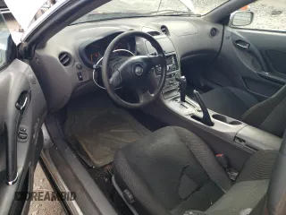 2001 Toyota Celica GT z VIN JTDDR32T910100289, wystawiony jako Copart lot #49600415 z przebiegiem 227 862 mil mil oraz Czysty tytuł • Clean title. Historia ofert i sprzedaży dostępna na DreamBid. Obrazek 8.