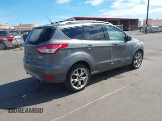 2013 Ford Escape Titanium with VIN 1FMCU0J9XDUC16155, listed as a IAAI auction lot 42373566 with 132,608 mi miles and . Bid and sale history available at DreamBid. Image 4.