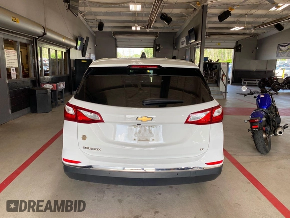2021 Chevrolet Equinox LT with VIN 3GNAXJEV3MS121427, listed as a IAAI auction lot 42624683 with 46,434 mi miles and . Bid and sale history available at DreamBid. Image 2.