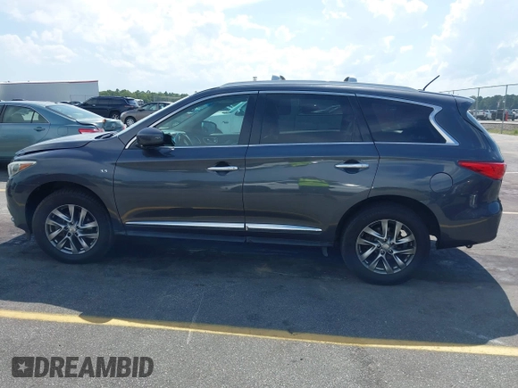 2014 Infiniti QX60 with VIN 5N1AL0MM6EC540477, listed as a IAAI auction lot 42791362 with 143,181 mi miles and . Bid and sale history available at DreamBid. Image 14.