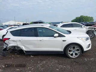 2019 Ford Escape Titanium with VIN 1FMCU9J97KUA03195, listed as a IAAI auction lot 42656589 with 40,099 mi miles and . Bid and sale history available at DreamBid. Image 13.