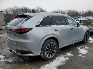2024 Mazda CX-90 S Premium z VIN JM3KKDHC7R1147911, wystawiony jako Copart lot #83414044 z przebiegiem 11 220 mil mil oraz Szkoda całkowita • Salvage title. Historia ofert i sprzedaży dostępna na DreamBid. Obrazek 3.