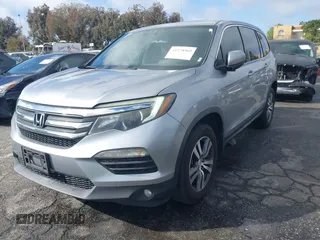2016 Honda Pilot EX-L with VIN 5FNYF5H57GB038349, listed as a IAAI auction lot 41378569 with 117,651 mi miles and . Bid and sale history available at DreamBid. Image 2.