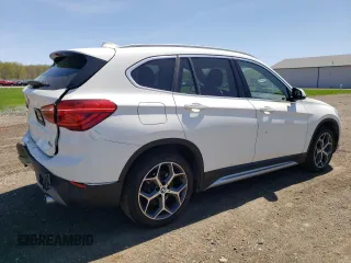 2019 BMW X1 xDrive28i with VIN WBXHT3C51K3H35953, listed as a Copart auction lot 54751675 with 54,802 mi miles and Salvage title. Bid and sale history available at DreamBid. Image 3.