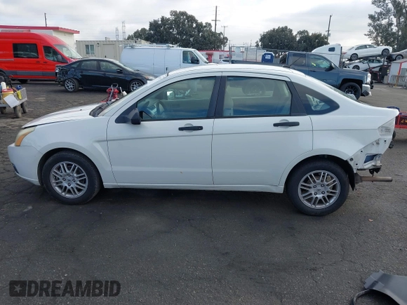 2010 Ford Focus SE with VIN 1FAHP3FN5AW146403, listed as a IAAI auction lot 40955575 with 128,243 mi miles. Bid and sale history available at carsss.com. Image 15.