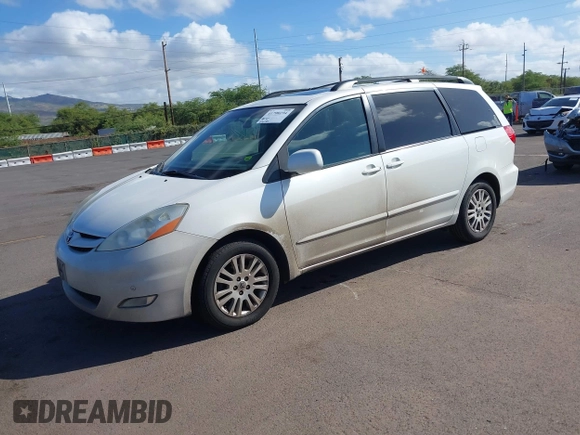2010 Toyota Sienna XLE with VIN 5TDYK4CC3AS336590, listed as a IAAI auction lot 41798194 with 230,707 mi miles. Bid and sale history available at carsss.com. Image 17.