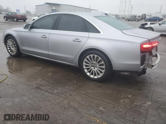 2015 Audi A8 z VIN WAUJGAFD0FN010021, wystawiony jako Copart lot #86861684 z przebiegiem 112 697 mil mil oraz Szkoda całkowita • Salvage title. Historia ofert i sprzedaży dostępna na DreamBid. Obrazek 2.