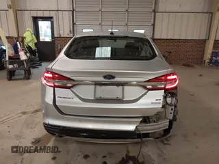2017 Ford Fusion SE z VIN 3FA6P0H95HR203170, wystawiony jako IAAI lot #41569303 z przebiegiem 143 287 mil mil oraz . Historia ofert i sprzedaży dostępna na DreamBid. Obrazek 17.