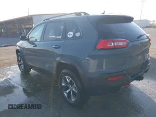 2014 Jeep Cherokee Trailhawk z VIN 1C4PJMBS2EW212341, wystawiony jako IAAI lot #40672694 z przebiegiem 108 622 mil mil oraz . Historia ofert i sprzedaży dostępna na DreamBid. Obrazek 3.