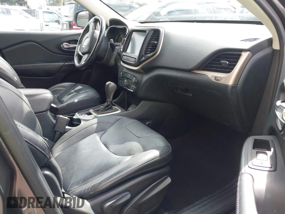 2016 Jeep Cherokee Limited with VIN 1C4PJLDS8GW233799, listed as a IAAI auction lot 41734376 with 114,187 mi miles. Bid and sale history available at carsss.com. Image 5.
