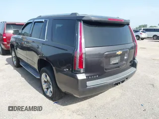 2015 Chevrolet Tahoe LTZ with VIN 1GNSCCKC2FR170090, listed as a IAAI auction lot 42616452 with 249,940 mi miles and . Bid and sale history available at DreamBid. Image 3.