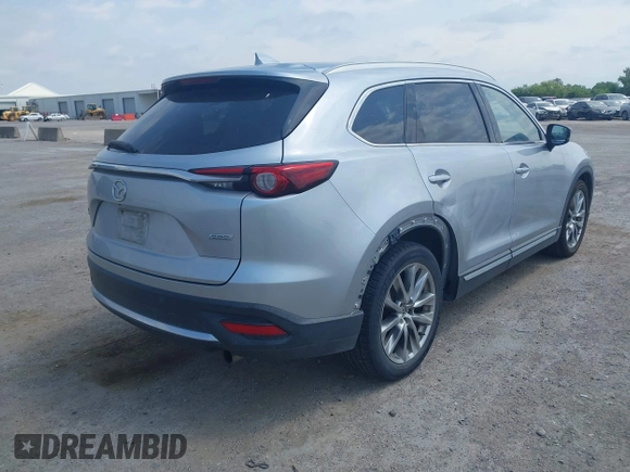 2016 Mazda CX-9 Signature with VIN JM3TCBEY9G0117785, listed as a IAAI auction lot 42331883 with 115,096 mi miles and . Bid and sale history available at DreamBid. Image 4.