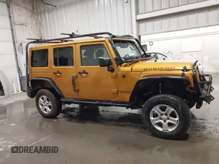 2014 Jeep Wrangler Unlimited Rubicon with VIN 1C4BJWFG7EL254534, listed as a IAAI auction lot 41279731 with 140,218 mi miles. Bid and sale history available at carsss.com. Image 13.