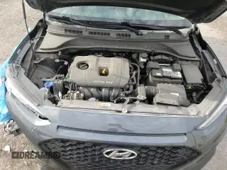 2021 Hyundai Kona SE z VIN KM8K12AA6MU611735, wystawiony jako Copart lot #81157595 z przebiegiem 53 404 mil mil oraz Szkoda całkowita • Salvage title. Historia ofert i sprzedaży dostępna na DreamBid. Obrazek 16.