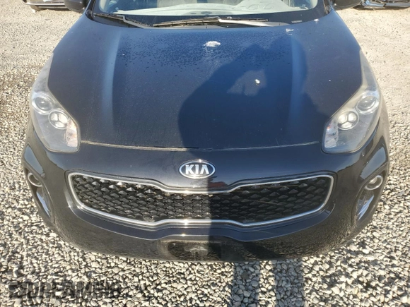 2017 Kia Sportage LX z VIN KNDPMCAC8H7235813, wystawiony jako Copart lot #52716515 z przebiegiem 135 221 mil mil oraz Szkoda całkowita • Salvage title. Historia ofert i sprzedaży dostępna na DreamBid. Obrazek 11.
