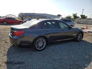 2011 BMW 7 Series 750i with VIN WBAKA8C58BCY37346, listed as a Copart auction lot 65017655 with 125,505 mi miles and Salvage title. Bid and sale history available at DreamBid. Image 3.